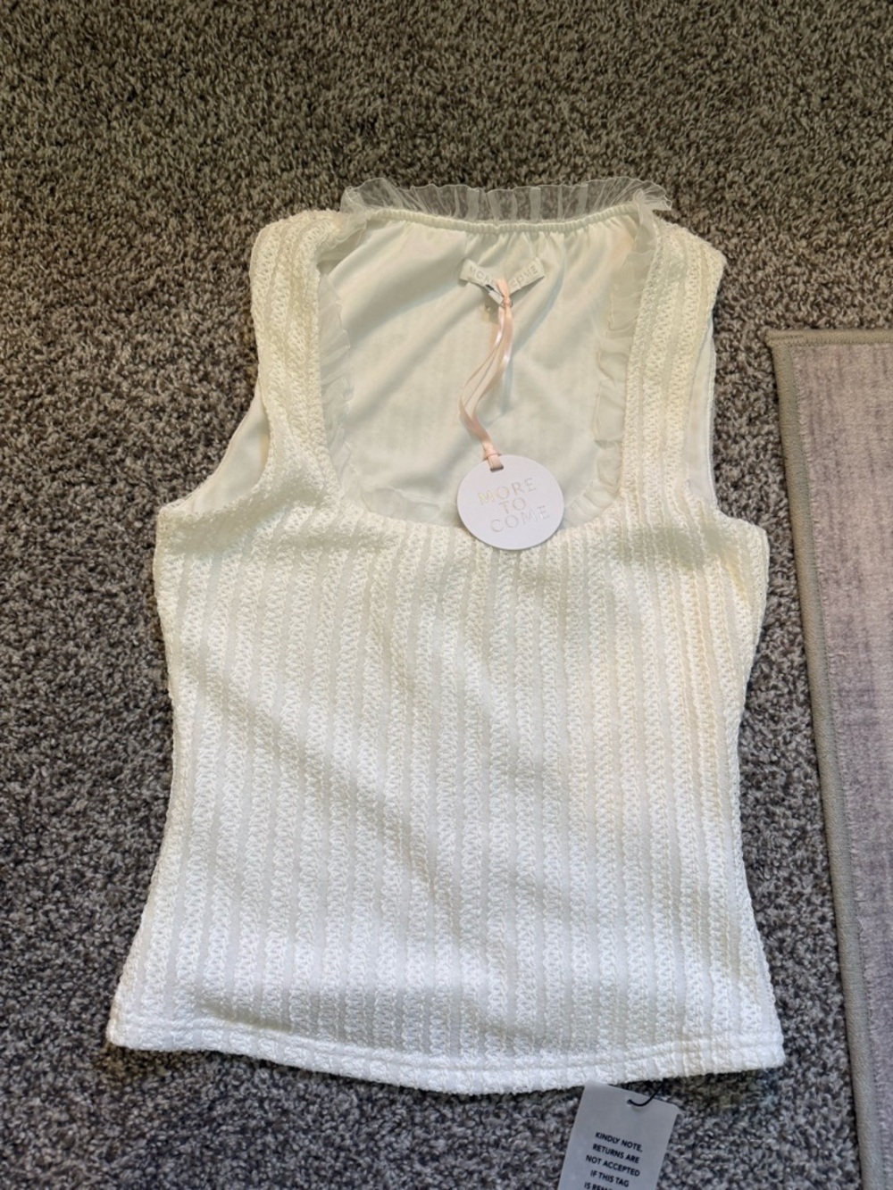 Women's Cream Sleeveless Knit Tank with Ruffle Trim